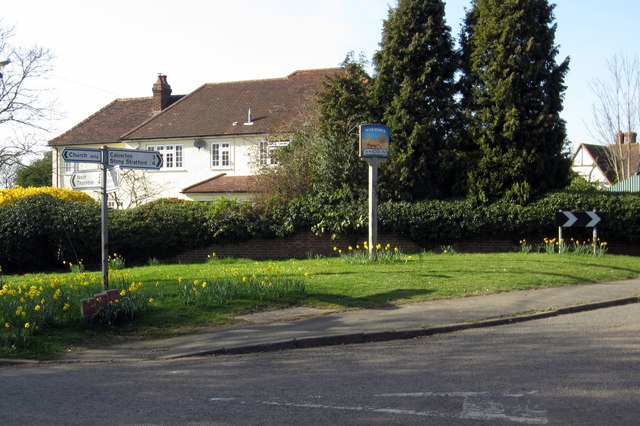 Whaddon Junction and village sign