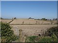 Farm buildings  set on a tilled drumlin