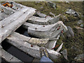 NG5709 : Old boat hull by Dave Croker