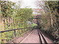 The steps down to go under a disused railway bridge