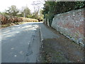 Buttressed boundary wall to Heathfield Park