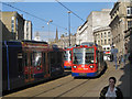 Trams, Fitzalan Square, morning rush hour