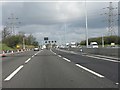 Power lines cross the M1 north of junction 10.