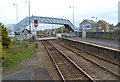 Footbridge and level crossing at the eastern end of Llanelli railway station