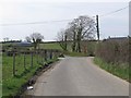 J1436 : Cross Roads on the Ouley Road by Eric Jones