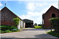 Red brick farm buildings in Leigh Lane