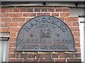 Trade  Plate  on  house  wall  East  End