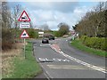 NZ1449 : Warning notices at a junction on the A691 by Christine Johnstone