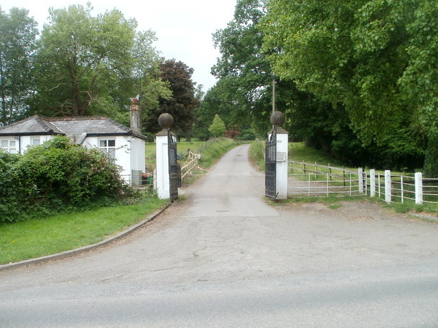 Lodge and entrance gates to Castle Farm, Llangybi