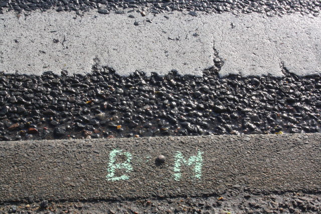 Benchmark on the kerb of A1168