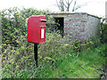 Postbox and small brick building