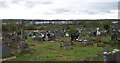 View across the eastern end of Milltown Cemetery in the direction of  M1 and the Boucher Shopping Centre