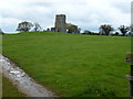TF8937 : St Edmund's church ruins alone on a green hill by Richard Humphrey