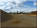 TL1744 : 20mm and sand stockpiles at Broom Quarry by Richard Law