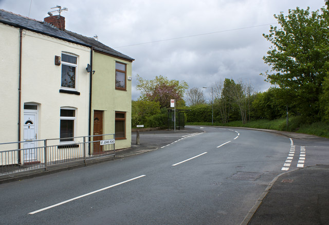 A bus stop on the corner of Tempest Road Chew Moor