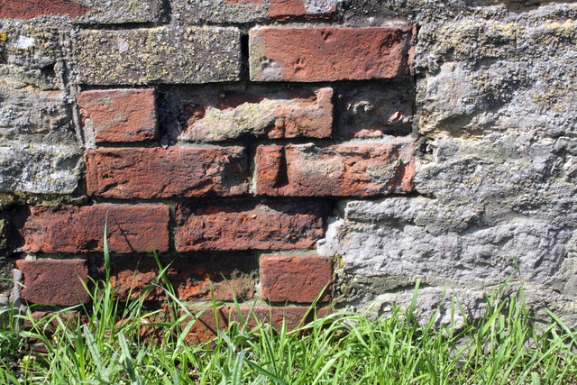 Old benchmark on building at Manor Farm