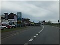 Car dealers and filling station at White Cross