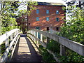 Footbridge and converted mill