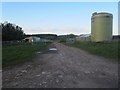 Storage tank and livestock pens near Wrangham