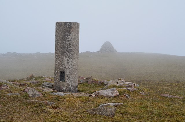 Trig point and cairn at the summit of Orval