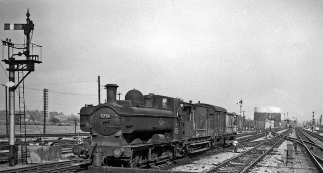 Eastward view from Didcot Station on the ex-GWR main line, with Pannier tank on a local goods train