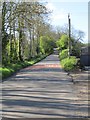 Minor road rising from the village of Long Compton