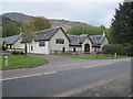 NN3118 : The Drovers Lodge opposite The Drovers Inn by John Firth
