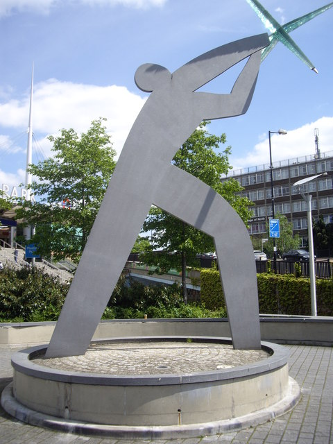 Modernistic sculpture of a field athlete