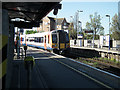 A train leaves Poole, headed for Weymouth