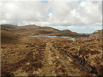 NC2441 : Stack/Duartmore track by Loch na h-Ath by AlastairG