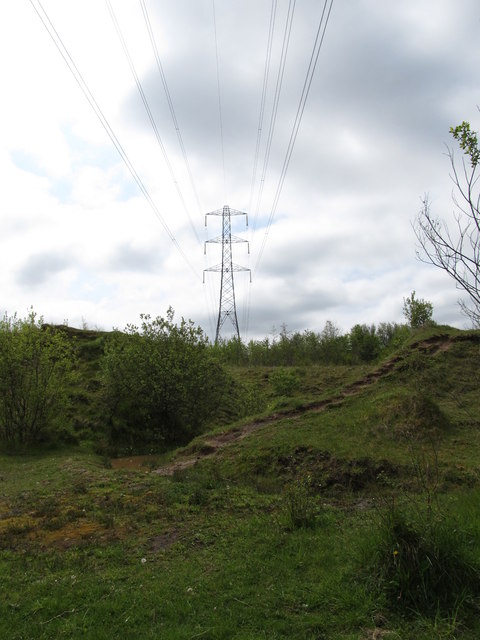 Powerlines crossing a former quarry on the edge of Colin Glen