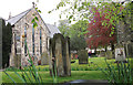 NY9864 : St Andrew's churchyard by michael ely
