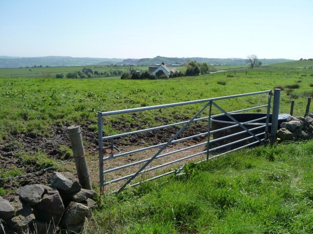 Gated ridgetop field entrance