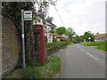 Bus stop by a phone box at East Stratton