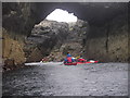 NF9260 : Sea kayaking the natural arch by chris denehy