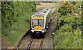 J4694 : Train, Ballycarry (2012-1) by Albert Bridge