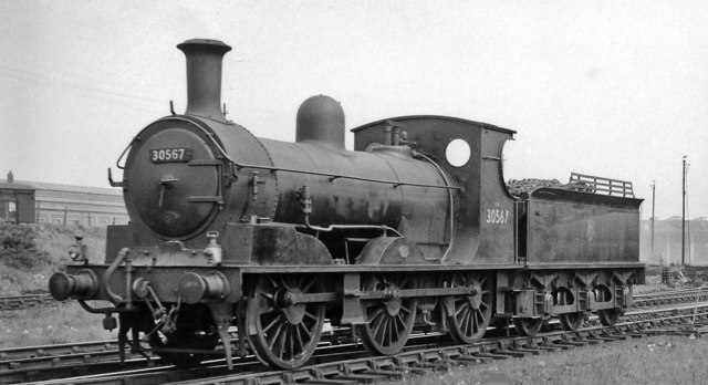 Elderly ex-LSWR 0-6-0 at Feltham Locomotive Depot