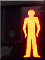 TQ1792 : Stanmore: red man and green light by Chris Downer