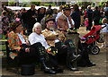TQ2887 : Morris dancers take a rest, Highgate Festival, 2012 by Jim Osley