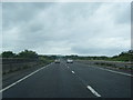 A55 westbound crosses the Chester-Wrexham railway