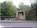 Waterfall and bus shelter, Chilcompton