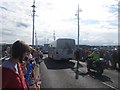 NT9952 : Heading across the bridge - Olympic torch relay (13) by Graham Robson