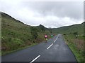 NS0046 : Cyclists on the Glen Sannox Road by John M