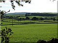 View across fields towards Peak Forest