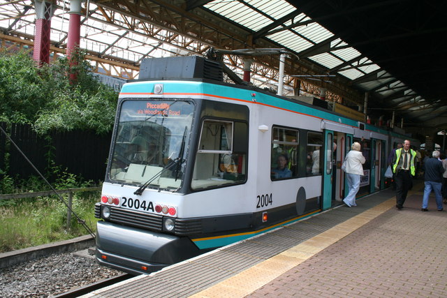 Manchester Victoria:  Tram 2004 southbound for Piccadilly