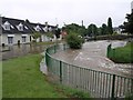 W6557 : Riverstick in flash flood by Hywel Williams