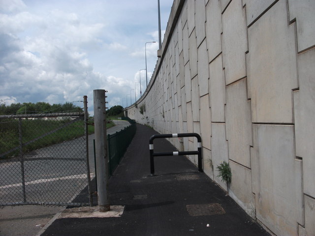 Wall and fence lined path