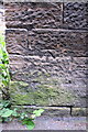 Benchmark on Skipton Road wall at Earl Street junction