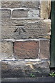 Benchmark on #5 The Barn, Front Street