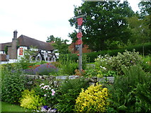 TQ4735 : Hartfield village sign by Marathon